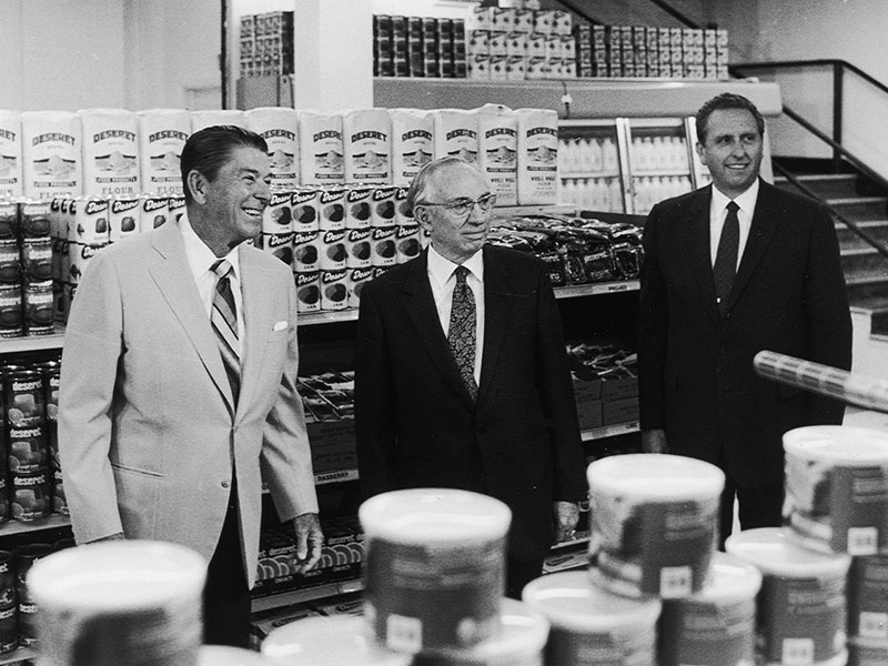 President Ronald Reagan touring the LDS welfare cannery in 1982, with Presidents Hinckley and Monson